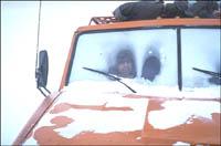 Man sat in lorry, windscreen frozen over