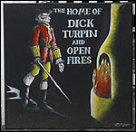 Sign saying 'Home of Dick Turpin and Open Fires'