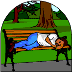 A man sleeping on a park bench.