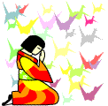 Japanese girl surrounded by origami cranes.