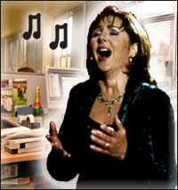 Lesley Garrett singing her heart out in the office.