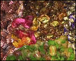 A cascade of sweets in colourful wrappers.