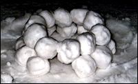 A second layer of snowballs on top of the first