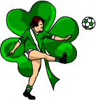 A Gaelic footballer kicking a football behind a shamrock